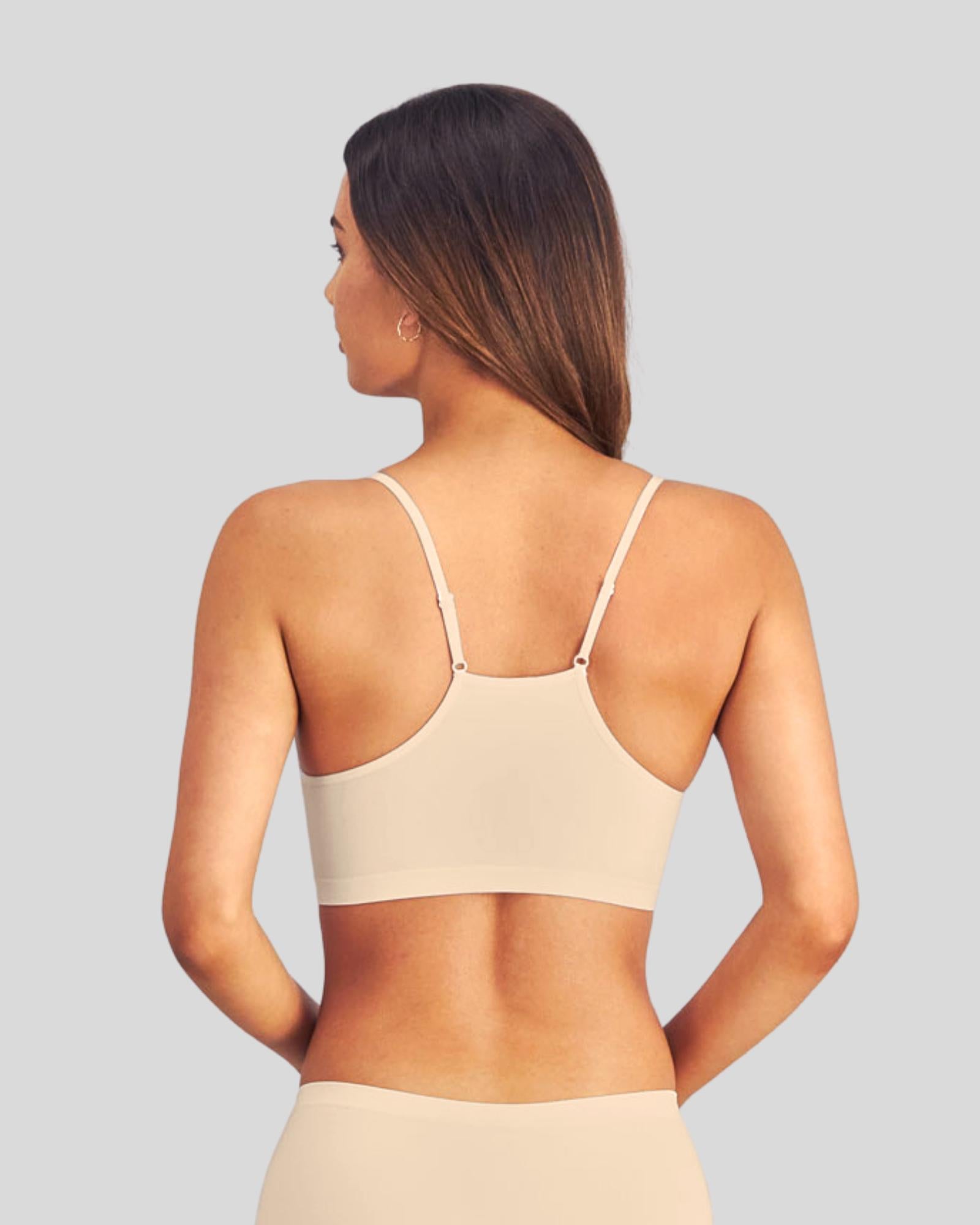 Model wears Simply Seamless Crop Top in Nude. On body back view