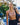 Woman in stamina bra standing outdoors with a blurred background