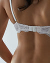 Model wears Keyhole Push Up Bra in PRISTINE/SILVER PEONY. On body back view