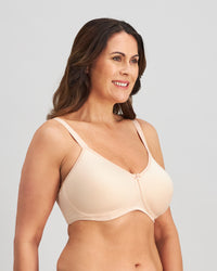 Model wears Bendon Restore Mastectomy Bra in LATTE. On body side view