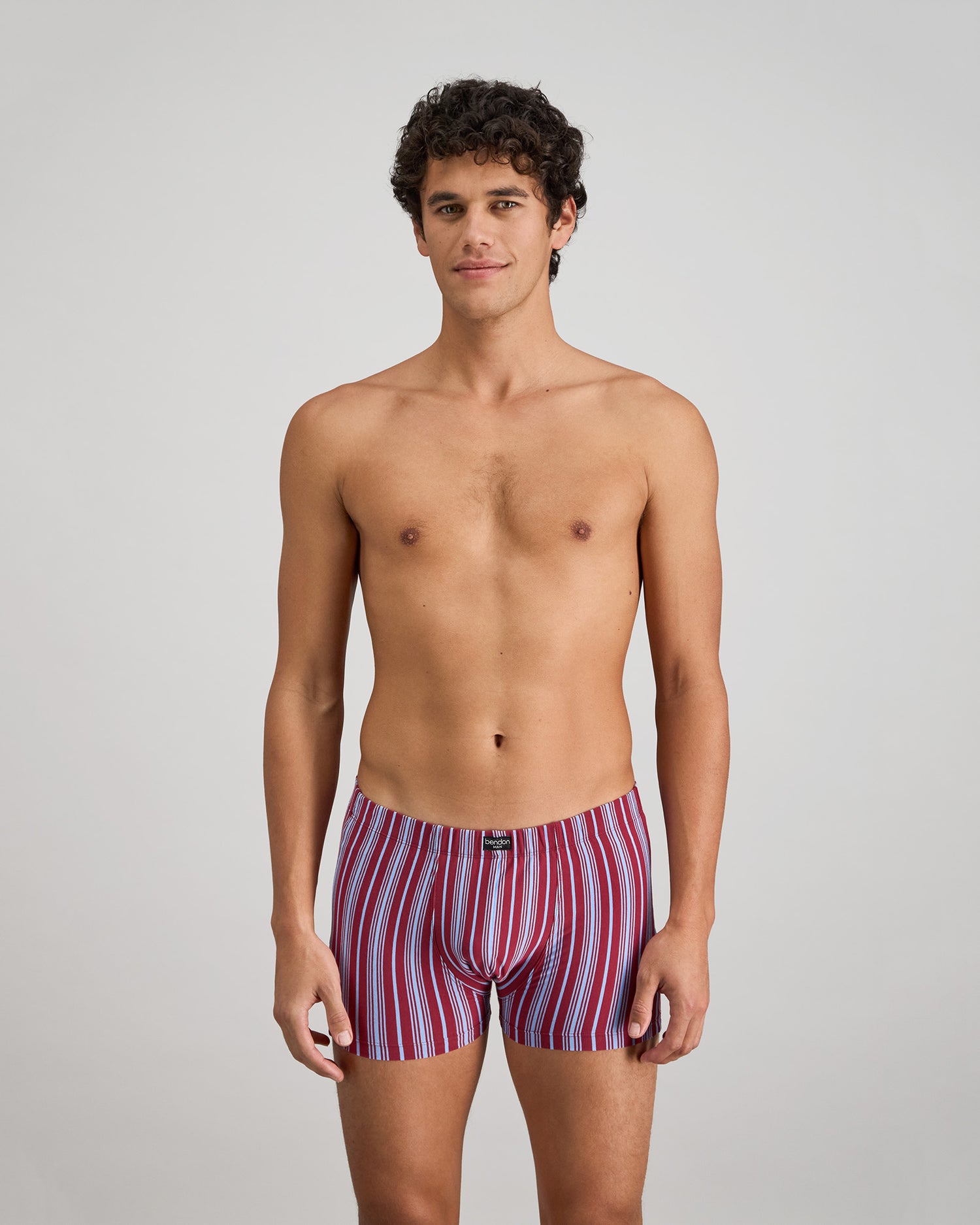 Cotton Stretch Mens Trunk in TIBETAN RED STRIPE. Feature shot