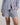 Model wears Cabana Stripe Short Pj in COOL BLUE. On body front view