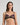 Model wears Niara Underwire Bra in BLACK/BEAUJOLAIS. On body front view