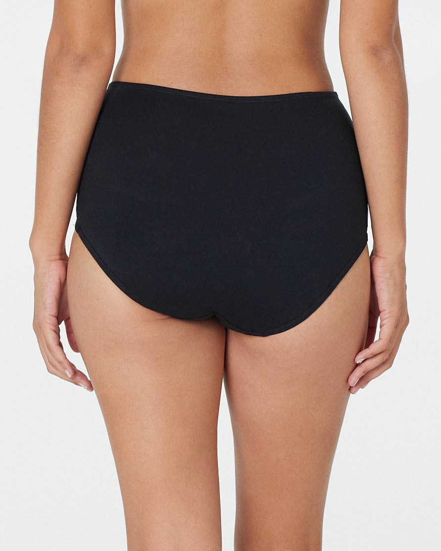 Model wears Freestyle Full Brief in BLACK. On body back view