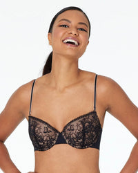 Model wears Naturally Me Contour Bra in BLACK. On body front view