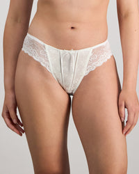 Model wears Yvette Bikini in WHITE. On body front view