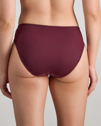 Model wears Coral High Cut Brief in FIG. On body back view