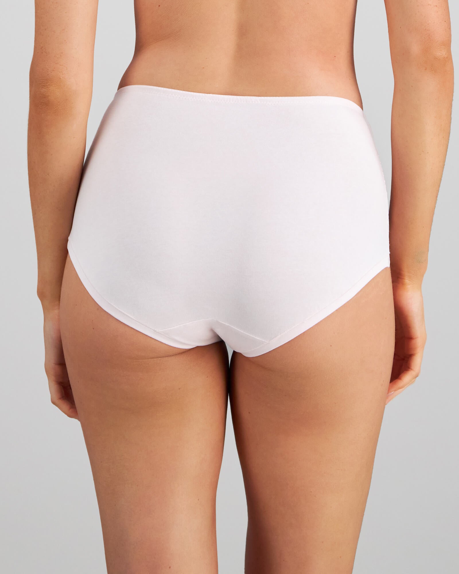 Model wears Embrace Full Brief in FESTIVAL BLOOM. On body back view