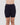 Model wears Smoothing Bodywear Chafer Short in BLACK. On body front view