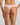 Model wears Au Naturel Thong in PALE LILAC. On body back view