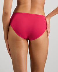 Model wears Extra-Ordinary Bikini in JAZZY. On body back view