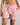 Model wears Cabana Stripe Boxer in CANDY CANE. On body front view