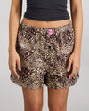 Model wears Sleigh The Night Boxer in WILD LYNX PRINT. On body front view