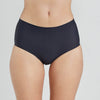 Model wears Flo Heavy Full Brief in BLACK. On body front view