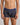 Model wears Retros Print Mens Trunk in IRONCREST PRINT. On body front view