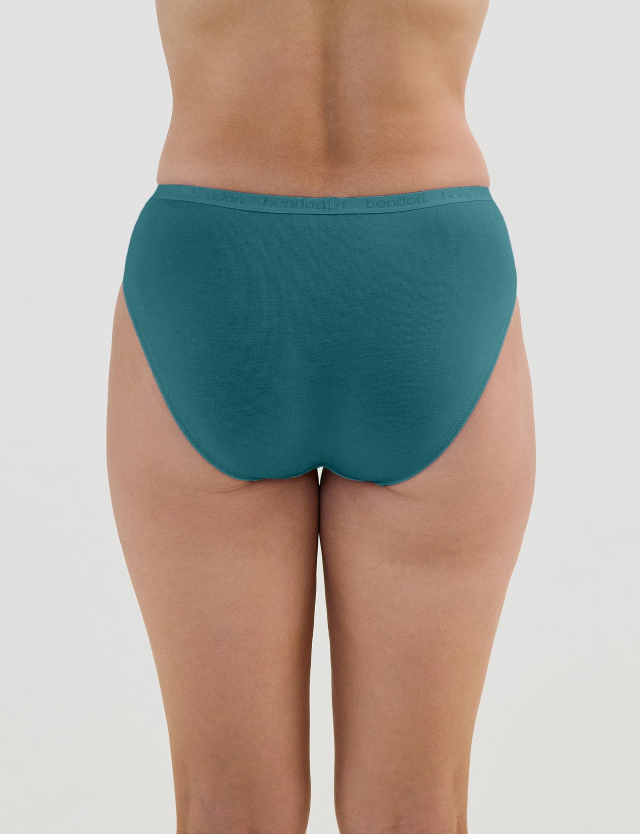 Model wears Body Cotton Bikini in RAIN FOREST. On body back view