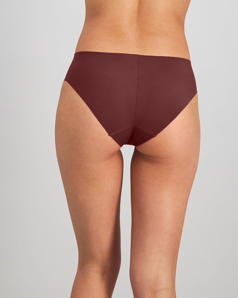 Model wears No Show Bikini in WINDSOR WINE. On body back view