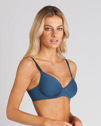 Model wears Weightless Form Contour Bra in BLUE WING TEAL. On body side view