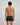 Model wears Cotton Stretch Mens Trunk in BLACK. On body back view