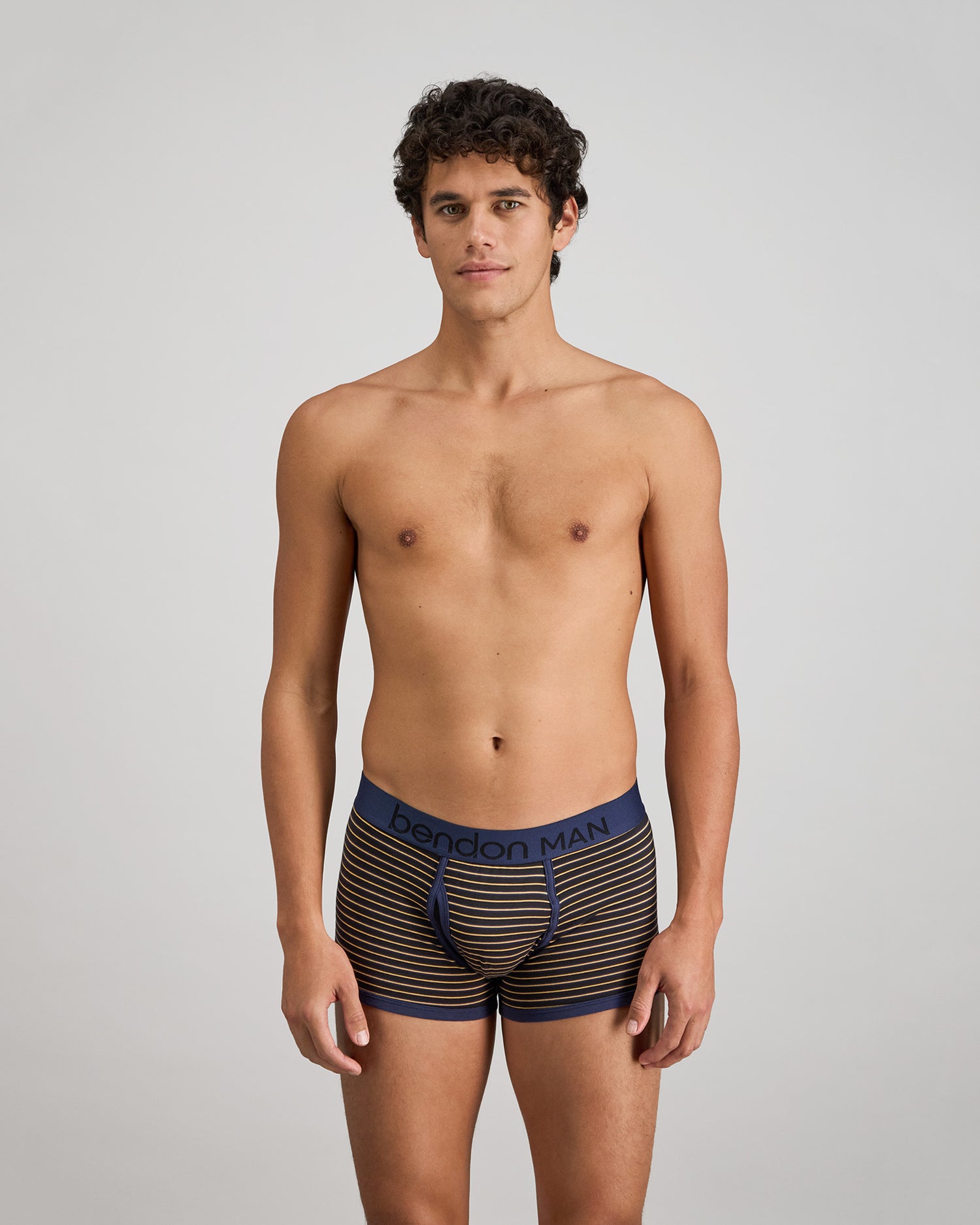 Bold Stripe Mens Trunk in BLACK/OAK BUFF STRIPE. Feature shot