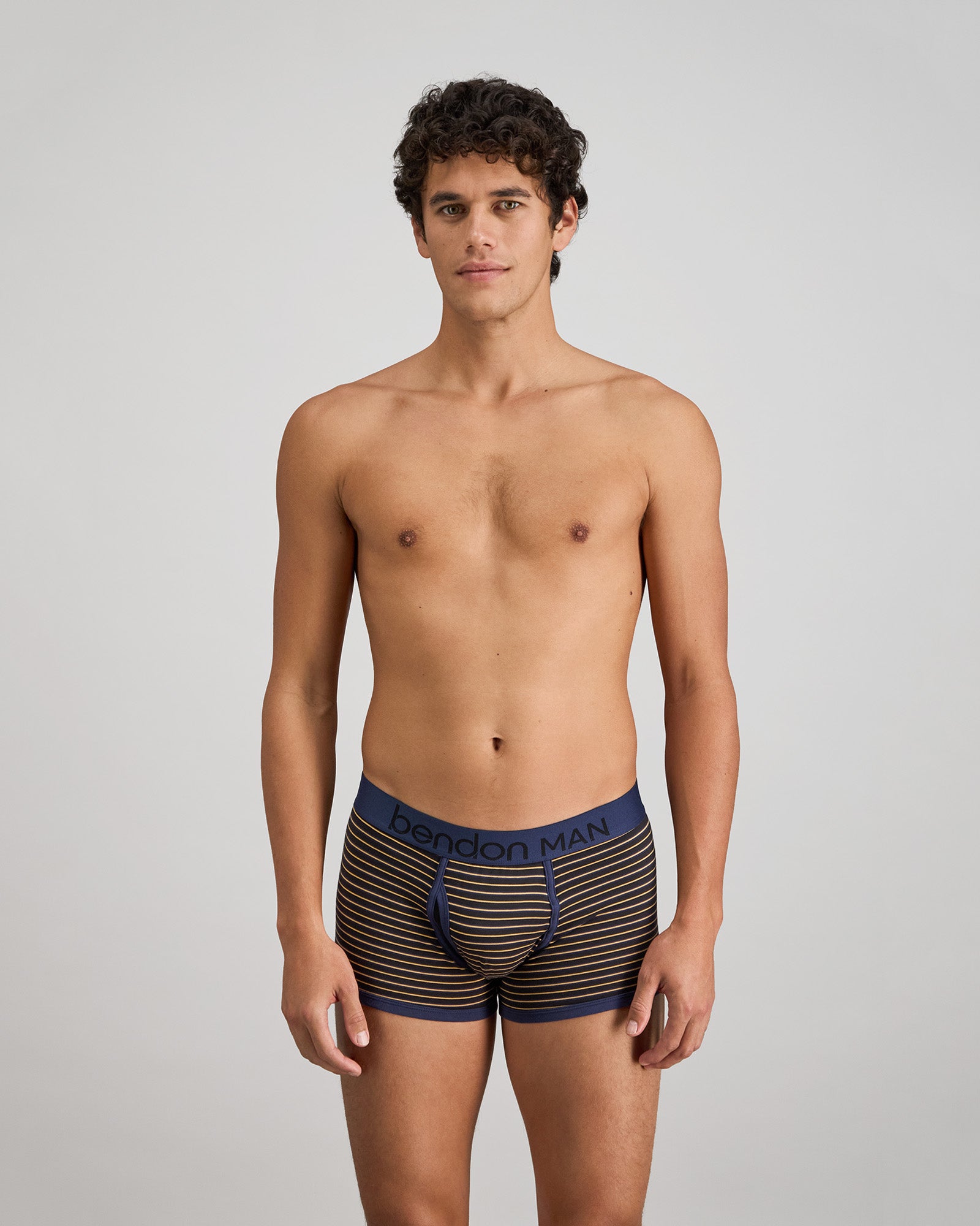 Bold Stripe Mens Trunk in BLACK/OAK BUFF STRIPE. Feature shot