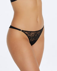Model wears Naturally Me Thong in BLACK. On body side view