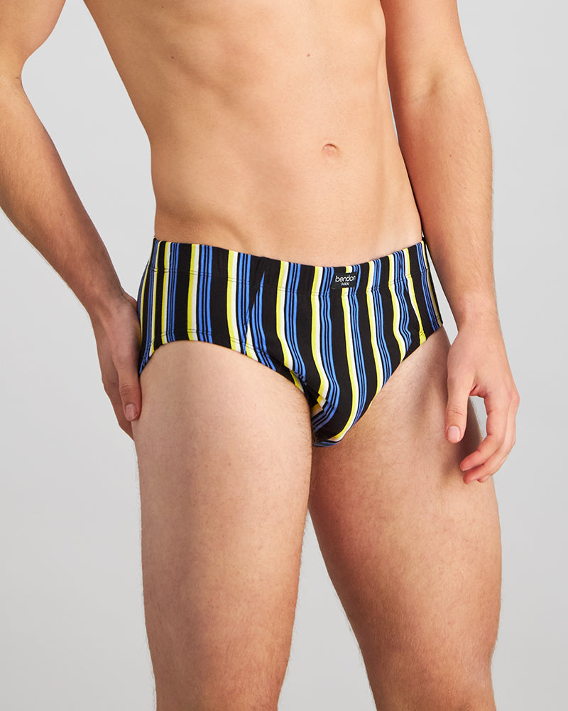 Model wears Cotton Stretch Mens Brief in YELLOW/REGATTA STRIPE. On body side view