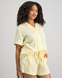 Model wears Bonbon Short Pj Set in TRANSPARENT YELLOW. On body side view