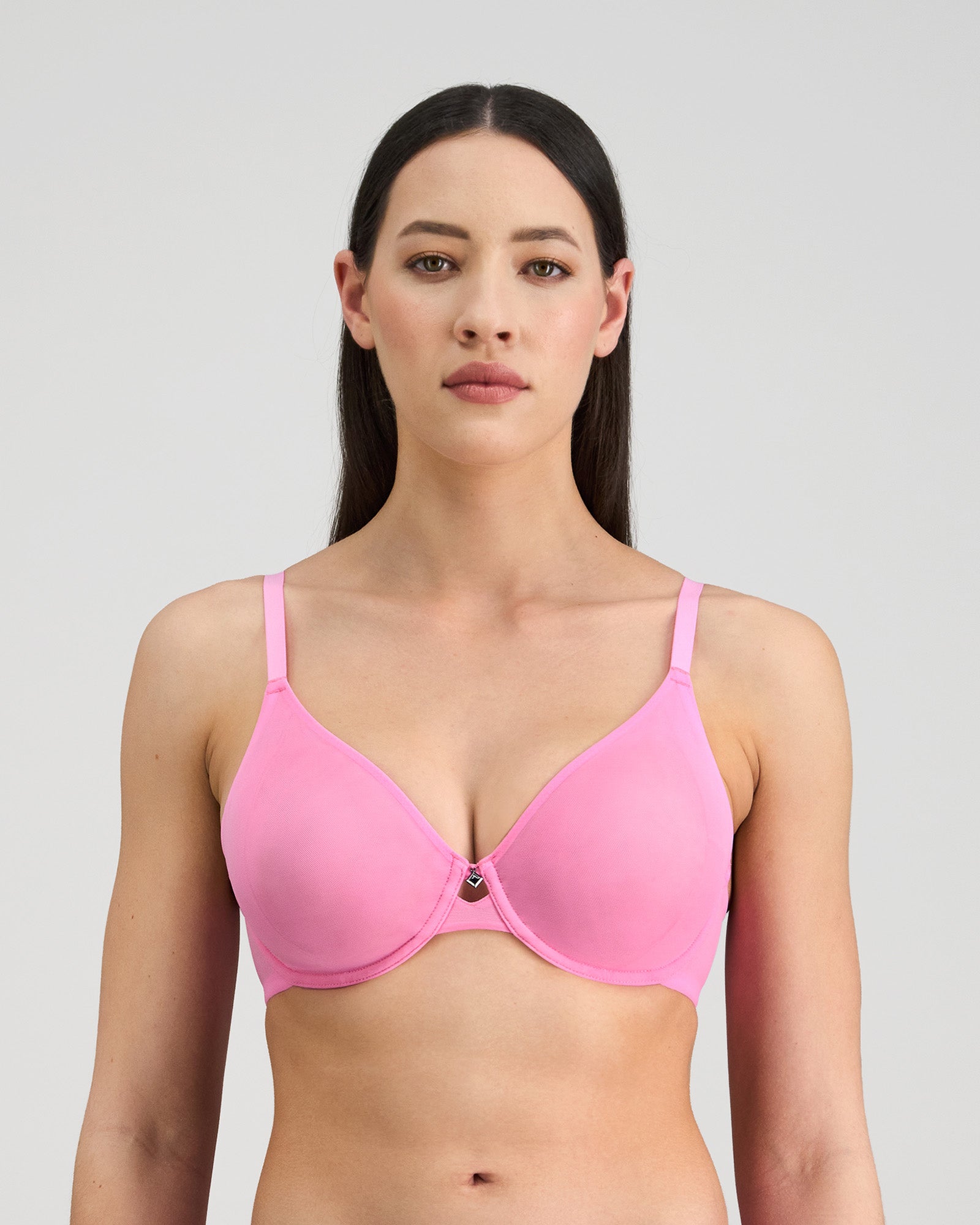 Model wears Lightweight Underwire Bra in BUBBLEGUM PINK. On body front view