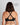 Model wears Power Underwire Bra in BLACK. On body back view