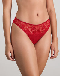 Model wears Adoration Thong in SALSA. On body side view