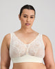 Model wears Midnight Express Wire Free Bra in EGRET. On body front view