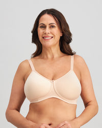 Model wears Bendon Restore Mastectomy Bra in LATTE. On body front view