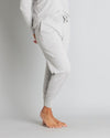 Model wears Insomnia Jogger in LIGHT GREY MARLE. On body side view