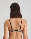 Model wears Adaline Contour Bra in BLACK FLORAL PRINT. On body back view