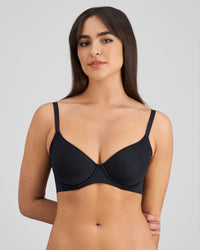 Model wears Flawless Form Contour Bra in BLACK. On body front view