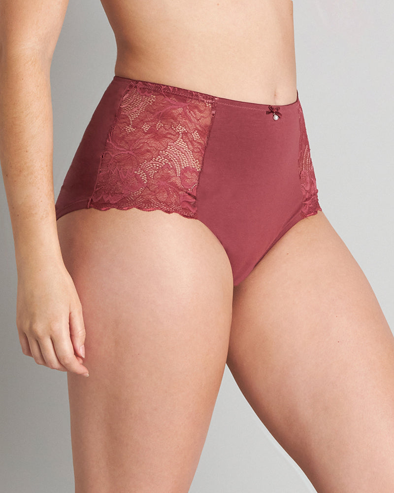 Model wears Embrace Full Brief in OXBLOOD RED. On body side view