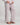 Model wears Cosy Flannel Long Pj Pant in PINK-A-BOO. On body side view