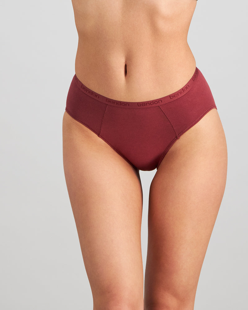 Model wears Body Cotton High Cut Brief Twin Pack in OXBLOOD RED/PEARL BLUSH. On body front view