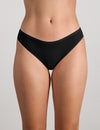 Model wears Extra-Ordinary Bikini Brief in BLACK. On body front view