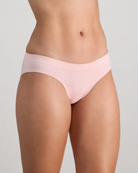 Model wears Seamless Soft Bikini in ICY PINK. On body side view