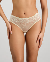 Model wears Lacey Brazilian in TRANSPARENT YELLOW. On body front view