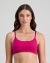 Model wears Extra-Ordinary Crop Top in FANTASY FUCHSIA. On body front view