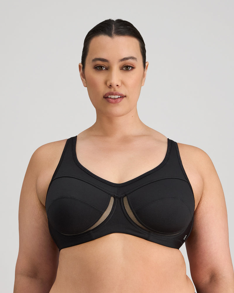 Model wears Bendon Sports Underwire Bra in BLACK. On body front view