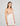 Model wears Eros Chemise in SUGAR. On body side view