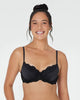 Model wears Body Lace Contour Bra in BLACK. On body front view