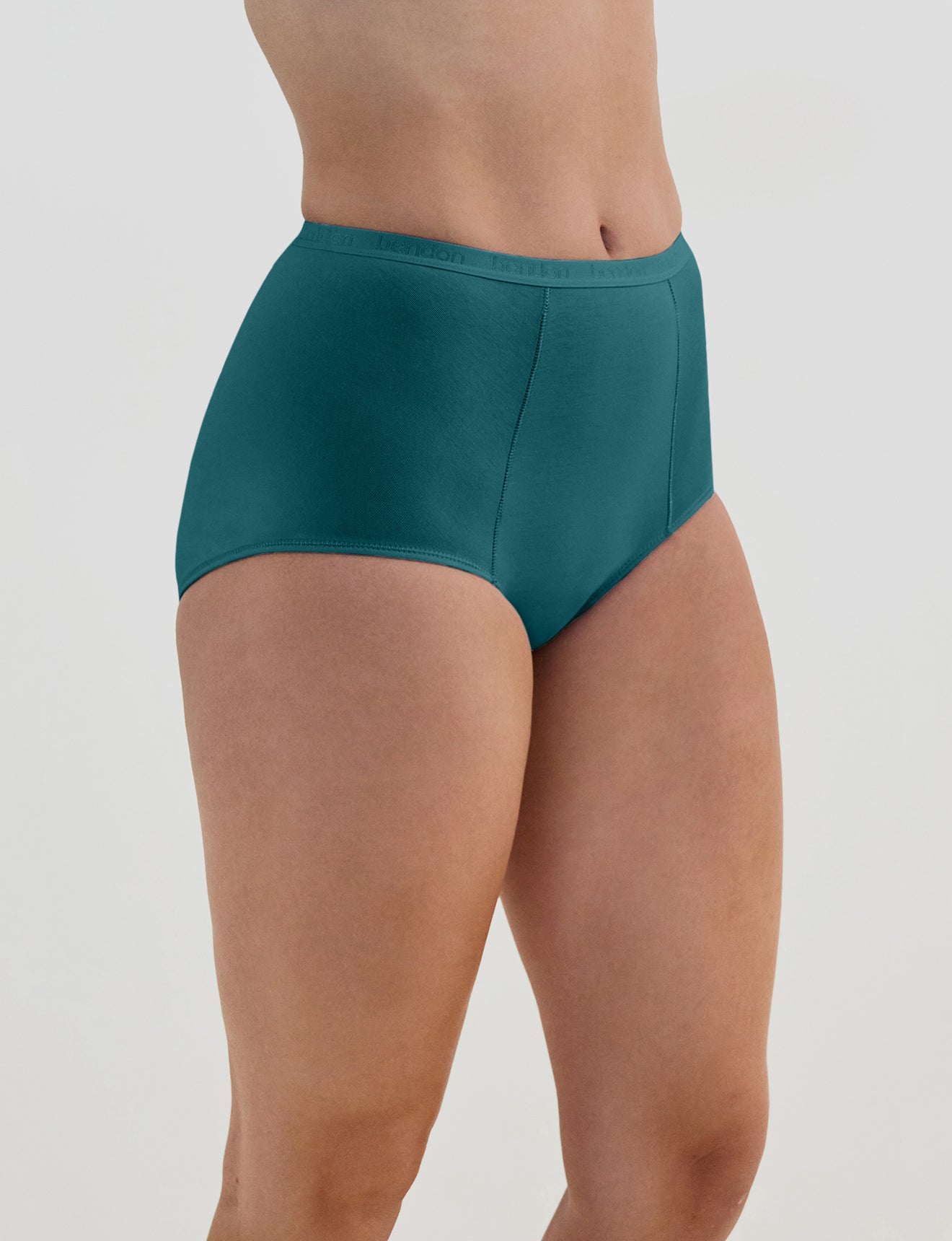 Model wears Body Cotton Full Brief in RAIN FOREST. On body side view