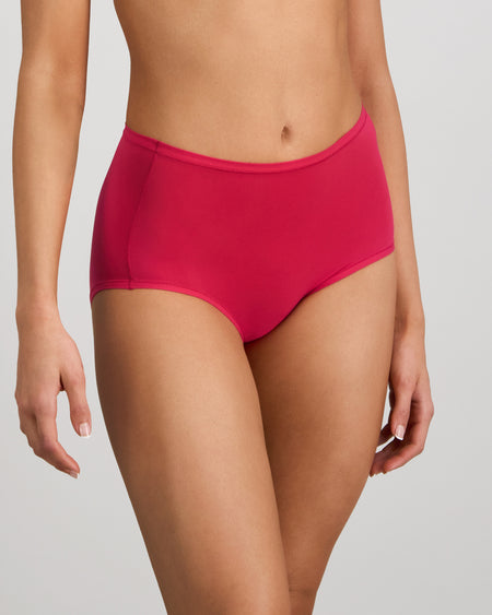 Model wears Extra-Ordinary Full Brief in JAZZY. On body side view