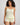 Model wears Smoothie Cami & Short Set in TRANSPARENT YELLOW. On body front view