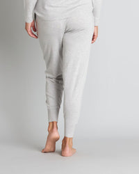 Model wears Insomnia Jogger in LIGHT GREY MARLE. On body back view